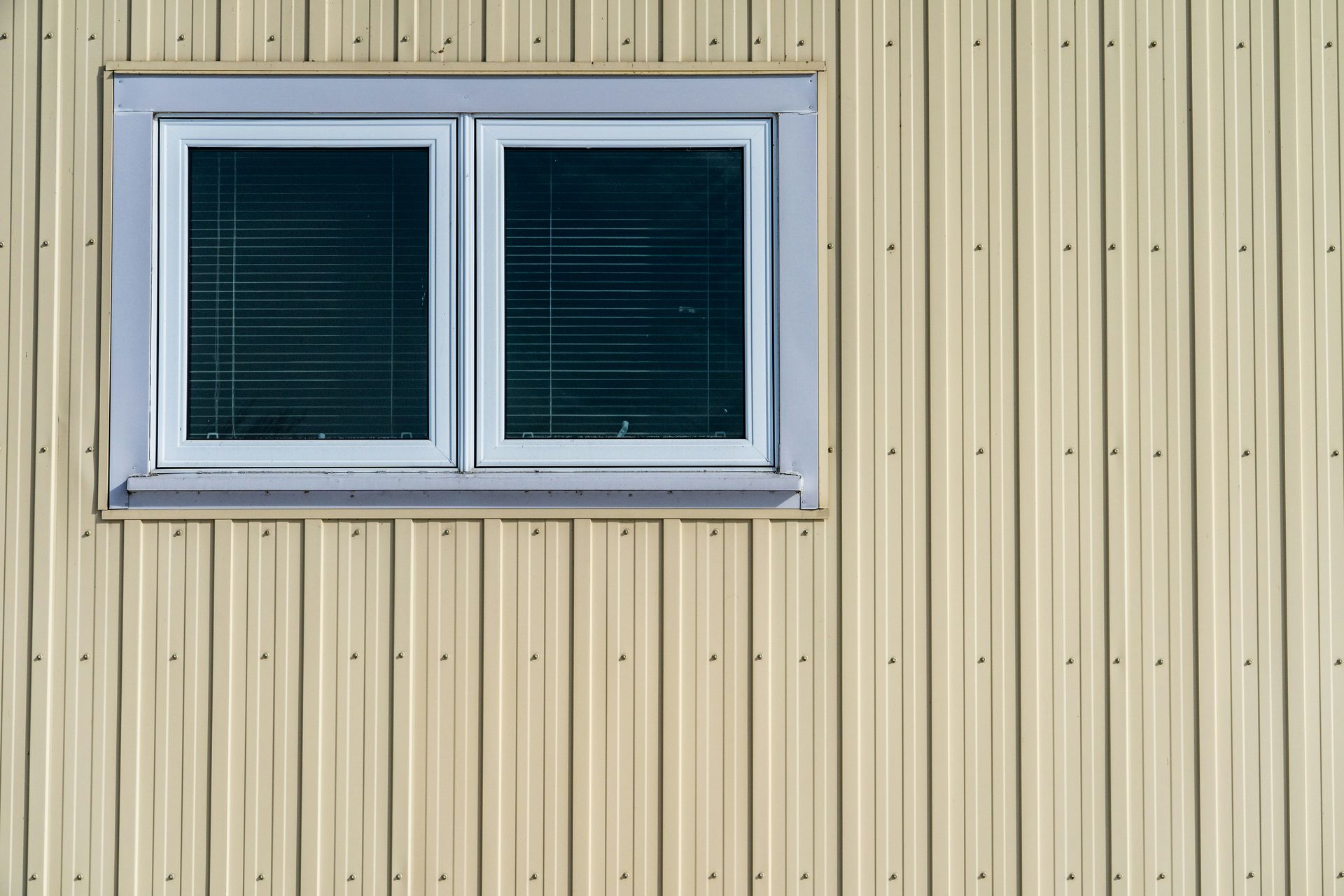 white wooden window frame with white window blinds